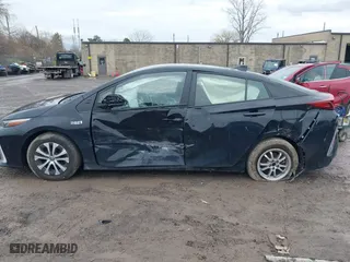 2021 Toyota Prius Prime LE with VIN JTDKAMFP2M3165859, listed as a IAAI auction lot 41943098 with 20,306 mi miles. Bid and sale history available at carsss.com. Image 15.