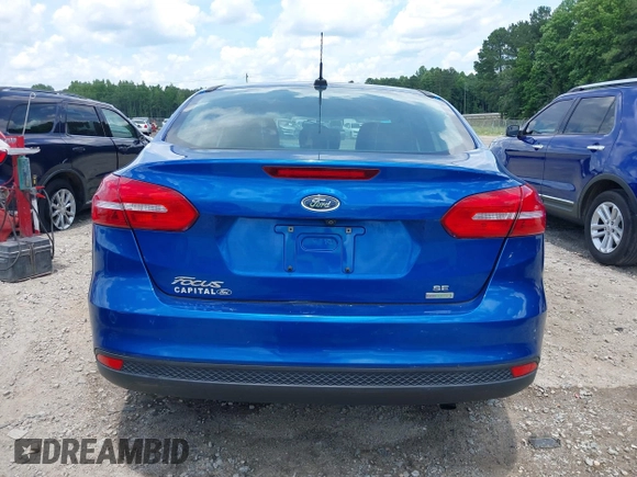 2018 Ford Focus SE with VIN 1FADP3FE8JL238024, listed as a IAAI auction lot 42463643 with Not provided miles and . Bid and sale history available at DreamBid. Image 16.
