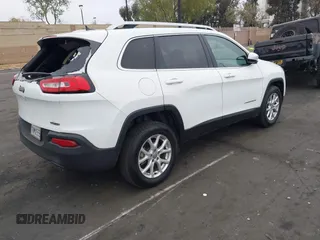 2015 Jeep Cherokee Latitude with VIN 1C4PJLCB0FW761871, listed as a IAAI auction lot 42099336 with 213,049 mi miles and . Bid and sale history available at DreamBid. Image 4.