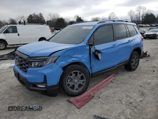 2025 Honda Passport TrailSport z VIN 5FNYF8H65SB009838, wystawiony jako Copart lot #87318814 z przebiegiem 2222 mil mil oraz Szkody całkowita. Historia ofert i sprzedaży dostępna na DreamBid. Obrazek 1.