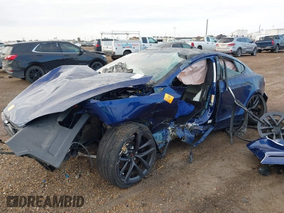 2021 Tesla Model S Long Range with VIN 5YJSA1E50MF432224, listed as a IAAI auction lot 41417130 with Not provided miles and . Bid and sale history available at DreamBid. Image 6.