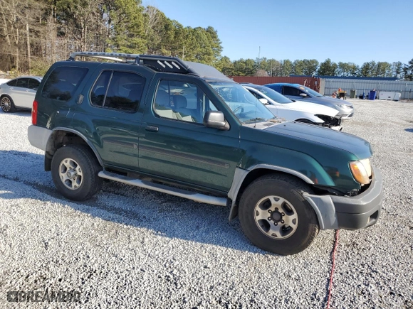 2001 Nissan Xterra XE with VIN 5N1ED28T71C528411, listed as a Copart auction lot 43587275 with 264,757 mi miles and Salvage Title. Bid and sale history available at carsss.com. Image 4.