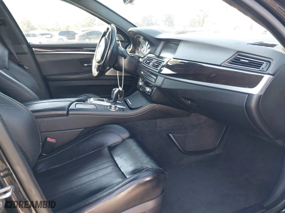 2013 BMW M5 with VIN WBSFV9C54DC772568, listed as a IAAI auction lot 41866486 with 99,072 mi miles. Bid and sale history available at carsss.com. Image 5.