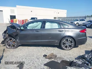 2020 Ford Fusion Titanium with VIN 3FA6P0K91LR175109, listed as a IAAI auction lot 42267532 with 75,000 mi miles and . Bid and sale history available at DreamBid. Image 14.
