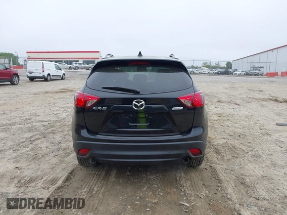 2014 Mazda CX-5 Touring with VIN JM3KE2CY7E0341658, listed as a IAAI auction lot 41915807 with 99,287 mi miles. Bid and sale history available at carsss.com. Image 17.