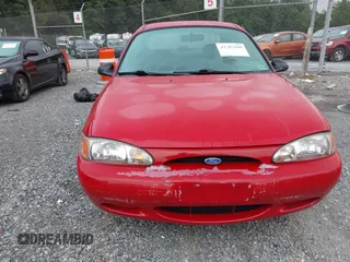 1997 Ford Escort LX z VIN 1FALP13P6VW375778, wystawiony jako IAAI lot #42787699 z przebiegiem 86 715 mil mil oraz . Historia ofert i sprzedaży dostępna na DreamBid. Obrazek 6.