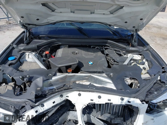 2021 BMW X4 xDrive30i with VIN 5UX2V1C03M9F12611, listed as a IAAI auction lot 42145740 with 60,417 mi miles and . Bid and sale history available at DreamBid. Image 10.