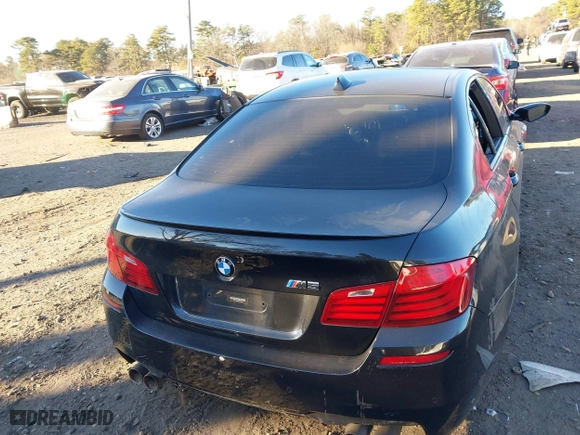 2014 BMW M5 with VIN WBSFV9C50ED097488, listed as a IAAI auction lot 41185321 with 72,891 mi miles. Bid and sale history available at carsss.com. Image 16.