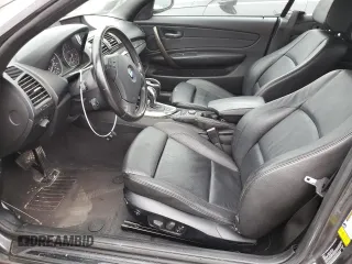 2013 BMW 1 Series 135i with VIN WBAUN7C52DVM27902, listed as a Copart auction lot 76493654 with 0 mi miles and Salvage Title. Bid and sale history available at carsss.com. Image 7.