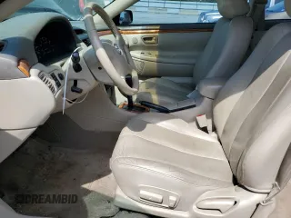 2003 Toyota Solara SE z VIN 2T1CF22P33C603259, wystawiony jako Copart lot #53045935 z przebiegiem 215 054 mil mil oraz Szkody całkowita. Historia ofert i sprzedaży dostępna na DreamBid. Obrazek 7.