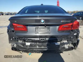 2020 BMW 5 Series M550i xDrive with VIN WBAJS7C07LCD97275, listed as a Copart auction lot 85764434 with Not provided miles and Clean title. Bid and sale history available at DreamBid. Image 6.