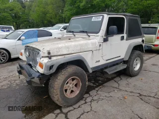 2005 Jeep Wrangler Sport with VIN 1J4FA49S55P334844, listed as a Copart auction lot 52026835 with 209,216 mi miles and Clean title. Bid and sale history available at DreamBid. Image 1.