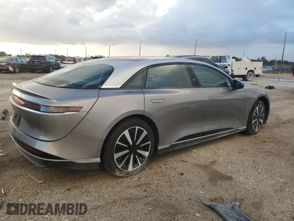 2023 Lucid Air Touring z VIN 50EA1TEA5PA004467, wystawiony jako Copart lot #76620154 z przebiegiem 6 108 mil mil oraz Szkoda całkowita • Salvage title. Historia ofert i sprzedaży dostępna na DreamBid. Obrazek 3.