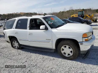 2005 GMC Yukon SLT z VIN 1GKEC13T25R136033, wystawiony jako Copart lot #48189995 z przebiegiem Nie podano mil oraz Szkoda całkowita • Salvage title. Historia ofert i sprzedaży dostępna na DreamBid. Obrazek 4.