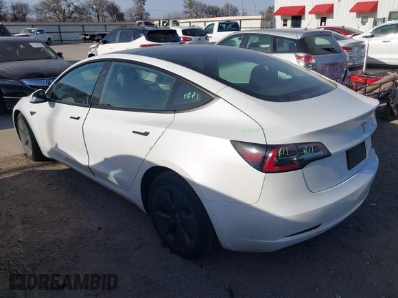 2023 Tesla Model 3 with VIN 5YJ3E1EAXPF436212, listed as a IAAI auction lot 41727400 with 81,011 mi miles and . Bid and sale history available at carsss.com. Image 3.