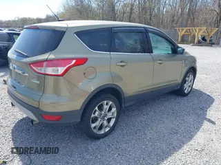 2013 Ford Escape SEL with VIN 1FMCU0HX3DUB37785, listed as a IAAI auction lot 41863069 with 179,508 mi miles. Bid and sale history available at carsss.com. Image 4.