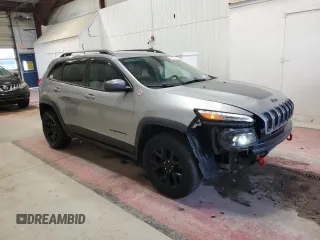 2017 Jeep Cherokee Trailhawk L Plus with VIN 1C4PJMBBXHW666051, listed as a Copart auction lot 51605455 with 99,259 mi miles and Salvage Title. Bid and sale history available at carsss.com. Image 4.