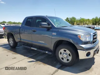 2010 Toyota Tundra with VIN 5TFUW5F14AX148898, listed as a Copart auction lot 63316765 with 79,983 mi miles and Salvage title. Bid and sale history available at DreamBid. Image 4.