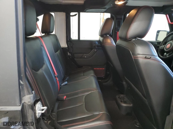 2017 Jeep Wrangler Unlimited Rubicon with VIN 1C4HJWFG2HL704847, listed as a Copart auction lot 48735825 with 100,953 mi miles and Salvage Title. Bid and sale history available at carsss.com. Image 11.