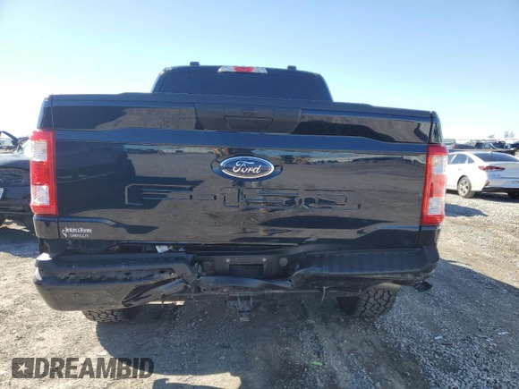 2023 Ford F-150 XL with VIN 1FTFW1E55PKD59670, listed as a Copart auction lot 48297005 with 20,668 mi miles and Salvage Title. Bid and sale history available at carsss.com. Image 6.