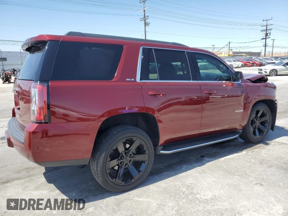 2019 GMC Yukon SLE with VIN 1GKS1AKC9KR355643, listed as a Copart auction lot 52050855 with 50,729 mi miles and Salvage Title. Bid and sale history available at carsss.com. Image 3.