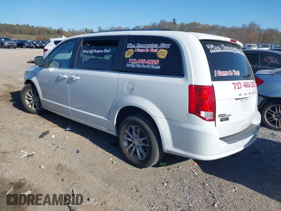 2019 Dodge Grand Caravan SXT with VIN 2C4RDGCG1KR545775, listed as a IAAI auction lot 42061287 with 131,603 mi miles and . Bid and sale history available at DreamBid. Image 3.