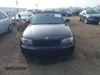 2010 BMW 1 Series 135i with VIN WBAUN9C54AVK41785, listed as a IAAI auction lot 41228825 with 60,817 mi miles and . Bid and sale history available at carsss.com. Image 12.