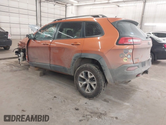 2015 Jeep Cherokee Trailhawk with VIN 1C4PJMBS5FW524462, listed as a IAAI auction lot 41774347 with 107,592 mi miles. Bid and sale history available at carsss.com. Image 3.