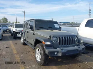 2019 Jeep Wrangler Unlimited Sport S with VIN 1C4HJXDNXKW521175, listed as a IAAI auction lot 41902053 with 56,184 mi miles and . Bid and sale history available at DreamBid. Image 1.