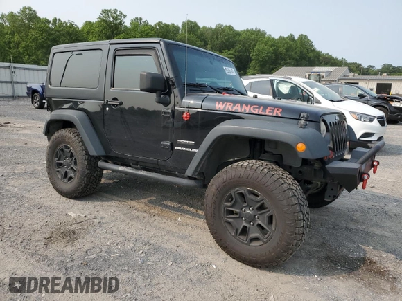 2013 Jeep Wrangler Sport z VIN 1C4AJWAG5DL671491, wystawiony jako Copart lot #59306745 z przebiegiem 111 778 mil mil oraz Szkoda całkowita • Salvage title. Historia ofert i sprzedaży dostępna na DreamBid. Obrazek 4.