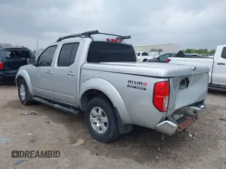 2005 Nissan Frontier LE with VIN 1N6AD07U25C457977, listed as a IAAI auction lot 41906592 with 256,116 mi miles and . Bid and sale history available at DreamBid. Image 3.