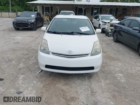 2006 Toyota Prius with VIN JTDKB20U567529834, listed as a IAAI auction lot 42119723 with 209,638 mi miles. Bid and sale history available at carsss.com. Image 6.