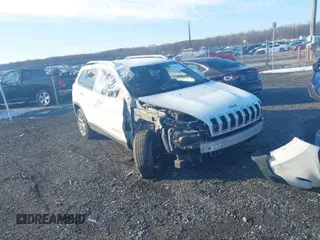 2015 Jeep Cherokee Latitude with VIN 1C4PJMCS6FW583776, listed as a IAAI auction lot 41432197 with 156,349 mi miles. Bid and sale history available at carsss.com. Image 1.