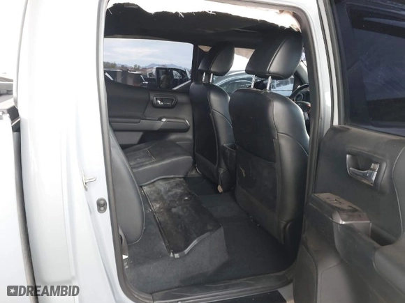2019 Toyota Tacoma 4WD SR with VIN 3TMCZ5ANXKM225066, listed as a IAAI auction lot 41825265 with 75,908 mi miles. Bid and sale history available at carsss.com. Image 8.