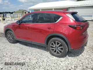 2018 Mazda CX-5 Grand Touring с VIN JM3KFBDM1J0332117, выставлен на аукционе Copart как лот 59379085 с пробегом 95 527 миль миль и Списание • Salvage title. История ставок и продаж доступна на DreamBid. Изображение 2.