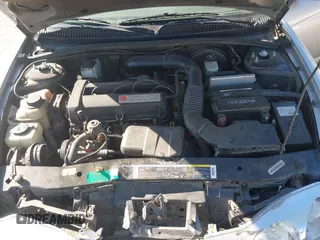2002 Saturn SC with VIN 1G8ZY14732Z144888, listed as a IAAI auction lot 41617831 with 138,564 mi miles. Bid and sale history available at carsss.com. Image 10.