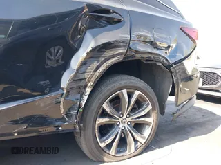 2020 Lexus RX with VIN JTJHZKEA3L2016365, listed as a IAAI auction lot 41615430 with 33,853 mi miles. Bid and sale history available at carsss.com. Image 6.