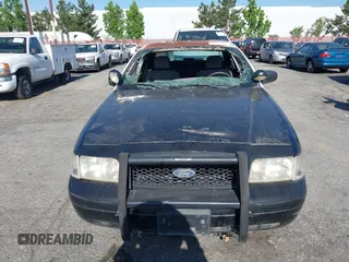 2008 Ford Police Interceptor z VIN 2FAFP71V18X150470, wystawiony jako IAAI lot #42301553 z przebiegiem 82 116 mil mil oraz . Historia ofert i sprzedaży dostępna na DreamBid. Obrazek 12.