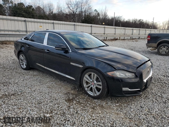 2016 Jaguar XJ Portfolio with VIN SAJWA2G71G8V95573, listed as a Copart auction lot 85975594 with 82,221 mi miles and Salvage title. Bid and sale history available at DreamBid. Image 4.