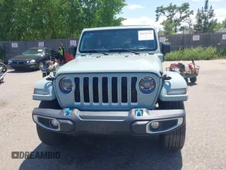2023 Jeep Wrangler Sahara with VIN 1C4JJXP68PW627007, listed as a IAAI auction lot 42474745 with 57,912 mi miles and . Bid and sale history available at DreamBid. Image 12.
