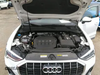 2022 Audi Q3 S line Premium Plus z VIN WA1EECF31N1045258, wystawiony jako IAAI lot #42299558 z przebiegiem 19 332 mil mil oraz . Historia ofert i sprzedaży dostępna na DreamBid. Obrazek 10.