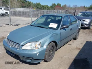 2000 Honda Civic LX with VIN 1HGEJ667XYL058591, listed as a IAAI auction lot 42113441 with 225,945 mi miles. Bid and sale history available at carsss.com. Image 2.
