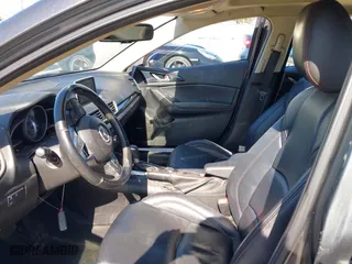 2016 Mazda Mazda3 i Grand Touring with VIN JM1BM1N74G1333699, listed as a IAAI auction lot 41836178 with 194,946 mi miles. Bid and sale history available at carsss.com. Image 5.