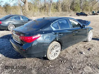 2014 Infiniti Q50 with VIN JN1BV7APXEM692303, listed as a IAAI auction lot 41325631 with 115,803 mi miles. Bid and sale history available at carsss.com. Image 4.