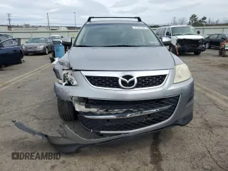 2010 Mazda CX-9 Grand Touring z VIN JM3TB3MV5A0210214, wystawiony jako Copart lot #51251585 z przebiegiem 138 885 mil mil oraz Szkoda całkowita • Salvage title. Historia ofert i sprzedaży dostępna na DreamBid. Obrazek 5.