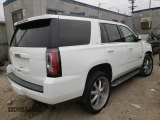 2017 GMC Yukon SLT with VIN 1GKS2BKC9HR125757, listed as a Copart auction lot 73427934 with 72,333 mi miles and Salvage Title. Bid and sale history available at carsss.com. Image 3.
