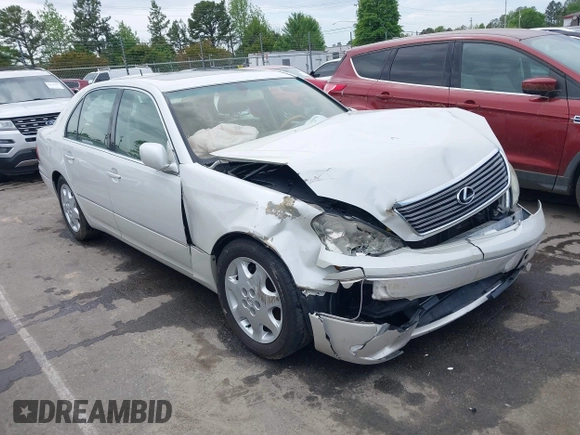 2001 Lexus LS 430 with VIN JTHBN30F110026221, listed as a IAAI auction lot 42022976 with 142,418 mi miles. Bid and sale history available at carsss.com. Image 1.