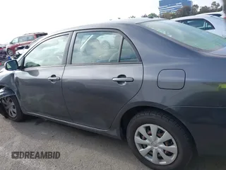 2011 Toyota Corolla L with VIN JTDBU4EE7B9162022, listed as a IAAI auction lot 42066643 with 124,384 mi miles. Bid and sale history available at carsss.com. Image 15.