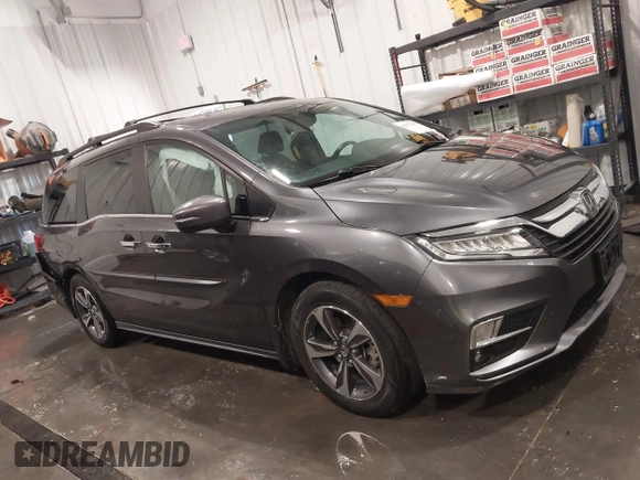 2018 Honda Odyssey Touring with VIN 5FNRL6H84JB041309, listed as a IAAI auction lot 42272247 with 90,371 mi miles and . Bid and sale history available at DreamBid. Image 13.