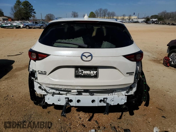 2021 Mazda CX-5 Signature with VIN JM3KFBEY5M0352778, listed as a Copart auction lot 47016035 with 37,961 mi miles and Salvage Title. Bid and sale history available at carsss.com. Image 6.
